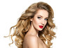 © Valua Vitaly - Pretty woman with long  hair and red lips.