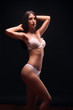 © HD92 - one young adult woman, standing model posing, black hair, white lingerie, white bra, white undergarment,