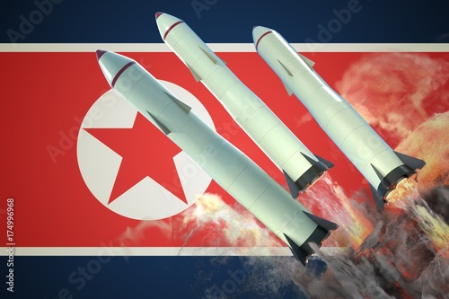Plakat Uruchomienie pocisków jądrowych. Flaga Korei Północnej w tle. 3D odpłacająca się ilustracja.
