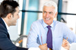 © Sergey Nivens - Businesspeople having meeting