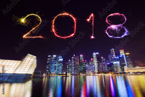 Photo 2018 Happy new year firework Sparkle with central business district building of