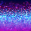 Glitter vintage lights background. Blue, purple and pink colors. vector illustration