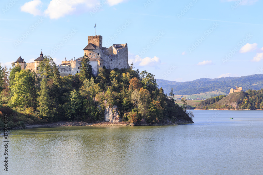 Lake Czorsztyn ,a man-made reservoir on Dunajec river, southern Poland, between  Pieniny and Gorce Mountains. On left is castle in Niedzica and on right castle ruins in Czorsztyn - obrazy, fototapety, plakaty 
