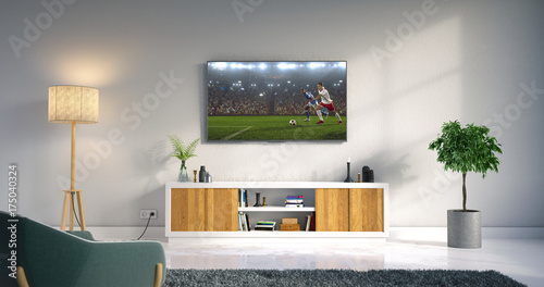 Living room led tv showing soccer game