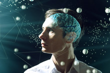 The Man's Head Businessman With Digital Brain And Connections Of Neurons. The Concept Of Artificial Intelligence