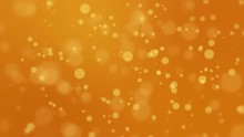 Beautiful Festive Orange Bokeh Background With Glowing Yellow Light Particles.