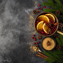 Christmas Food Background , Mulled Wine And Ingredients On Dark Grey Concrete Surface.