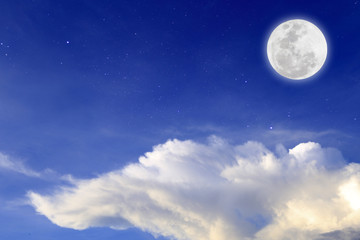 Wall Mural - blue night with full moon over cloud background. romantic concept.