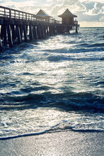Side View Of An Old Pier At Sunset