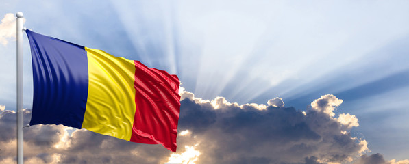 Wall Mural - Romania flag on blue sky. 3d illustration