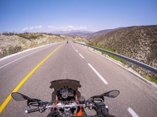 POV Ridding A Motorcycle On A Road