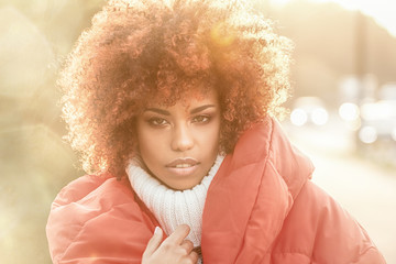 Wall Mural - Autumn portrait of african american girl.