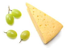 Piece Of Cheese With Grapes Isolated On White Background