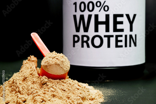 Whey Protein Powder in measuring scoop. - Buy this stock photo and explore  similar images at Adobe Stock | Adobe Stock