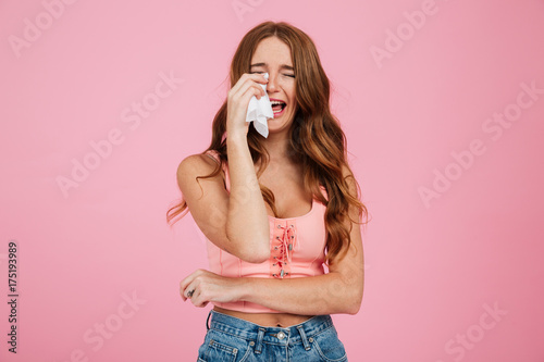 Portrait of a sad young woman in summer clothes Tableau sur Toile