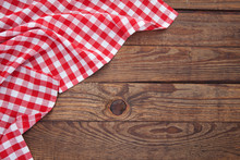 Old Vintage Wooden Table With A Red Checkered Tablecloth. Top View Mockup.