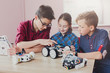 © Prostock-studio - Stem education. Kids creating robots at school