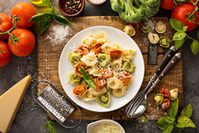 Red, White And Green Tortellini With Vegetables And Cheese
