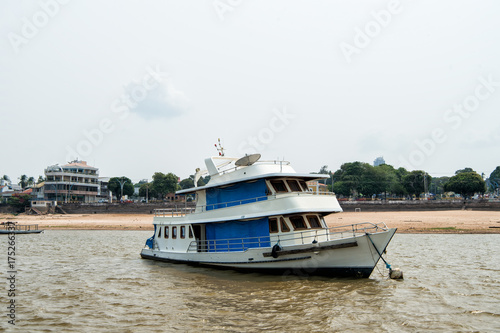 Fotografia, Obraz White ship at anchor on river in Santarem, Brazil