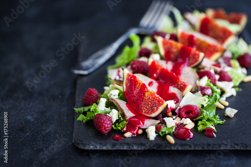 Fotografie, Obraz Delicious salad with fresh figs, duck meat and raspberry sauce