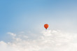 © Lea Csontos/Stocksy - Lonely hot air balloon floating on the sky above the clouds