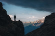 © RG&B Images/Stocksy - Mountaineer silhouette walking on a high mountain trail