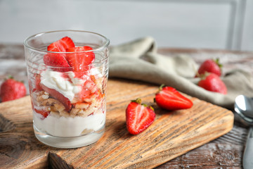 Sticker - Glass with strawberry pretzel salad on wooden board