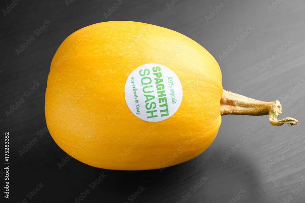 Ripe spaghetti squash on black background