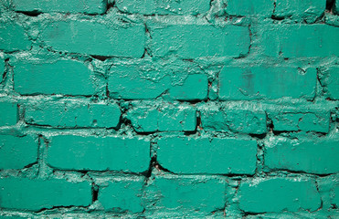 Wall Mural - Old green brick wall as a background close-up