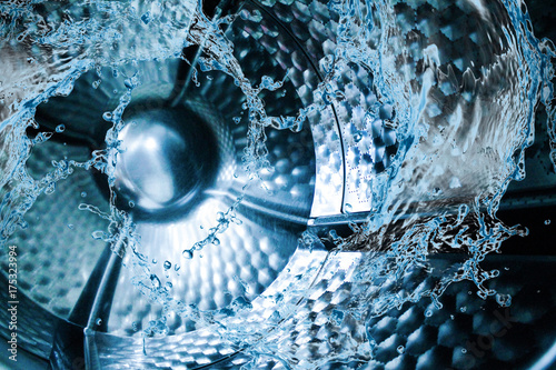 Fotografía Water splash of the washing machine drum