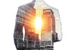 Double exposure of businessman and cityscape