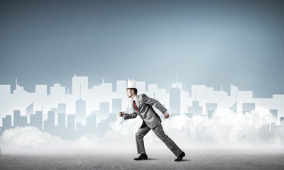 king businessman in elegant suit running and blue cityscape silh