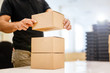 © NDABCREATIVITY - Boxing products ready for dispatching
