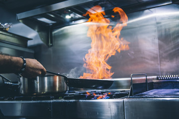 Chef cook with frying pan