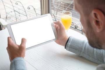 Poster - Tablet mockup. Guy hold tablet in horizontal position. App or responsive web site design promotion.