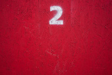 Horizontal Number On A Red Wall