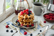 © jrwasserman/Stocksy - Delicious Belgium Waffles by Window