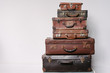 © Gillian van Niekerk/Stocksy - vintage suitcase stack