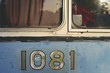 © nataliejeffcott/Stocksy - close up of old painted numbers on a bus