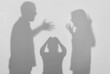 © Africa Studio - Silhouettes of quarreling parents and little child on white background. Domestic violence concept