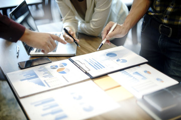 Sticker - Group of business man and woman discussing on the table about startup business