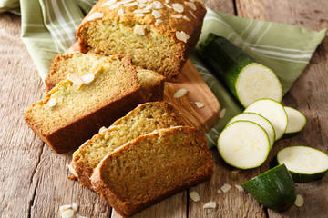 Gluten free zucchini loaf cake closeup on wooden background. horizontal