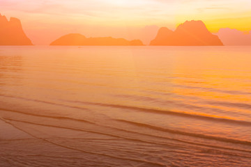 Wall Mural - Morning sunrise on the east coast of Thailand is the day where the sky looks bright and colorful.