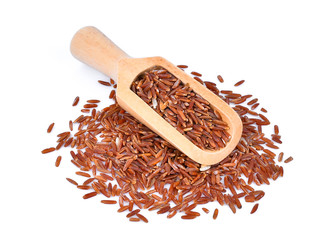 Poster - top view of brown rice in wooden scoop isolated isolated on white background