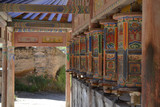 Fototapeta Młodzieżowe - The Tibetan kora or pilgrimage and prayer wheels in Xiahe (Labrang), Amdo Tibet