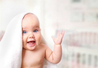 baby in towel.