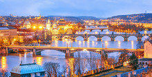 Classic View Of Prague At Twilight, Panorama Of Bridges On Vltava, View From Above, Beautiful Bridges Vista. Winter Scenery. Prague Is Famous And Extremely Popular Travel Destination. Czech Republic.