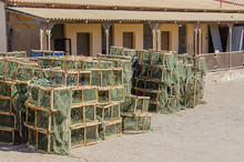 Many Lobster Or Crayfish Traps Stacked In Front Of Old Building, Luderitz, Namibia, Southern Africa