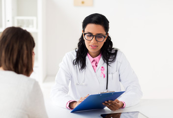 Canvas Print - doctor with pink awareness ribbon and patient