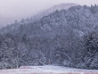 Cabin Nestled under a Snowy Mountain at Cades Cove in Smoky Mountain Nat'l Park